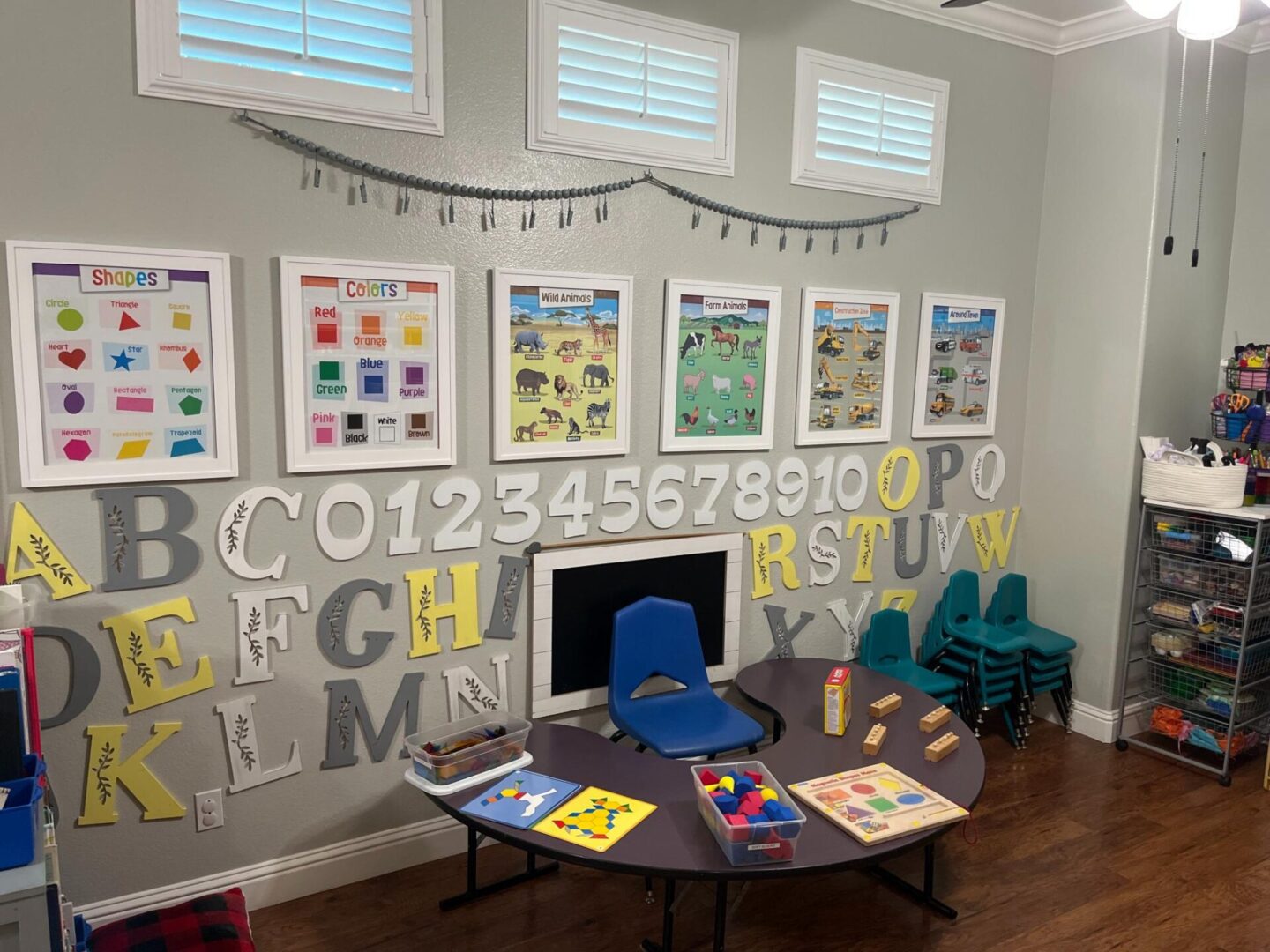 A room with many letters and numbers on the wall