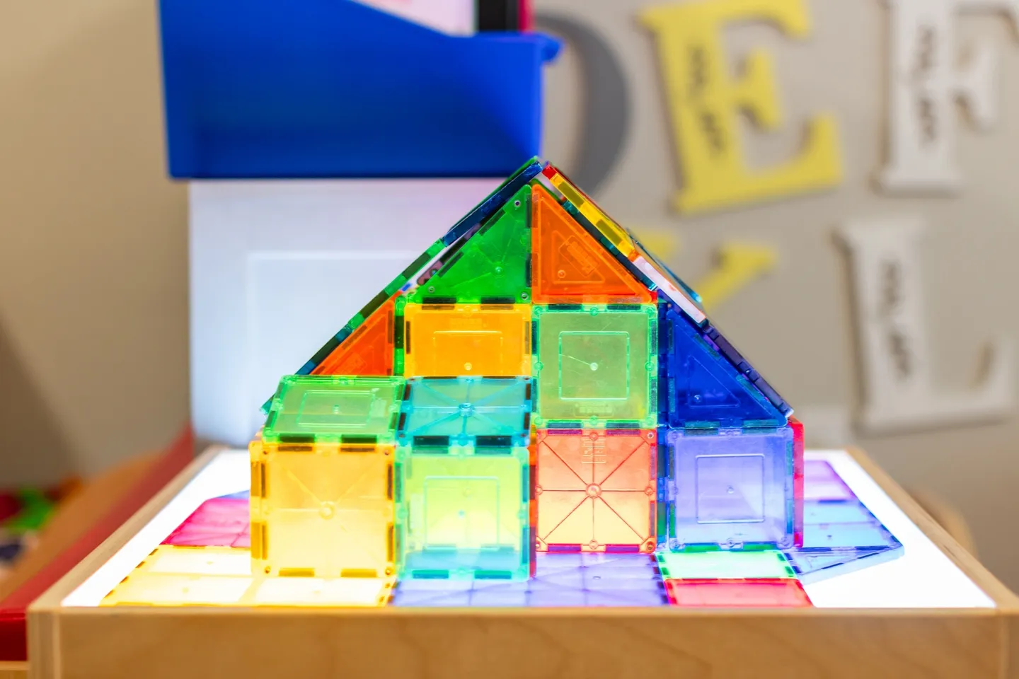 A colorful building made of magnetic tiles.