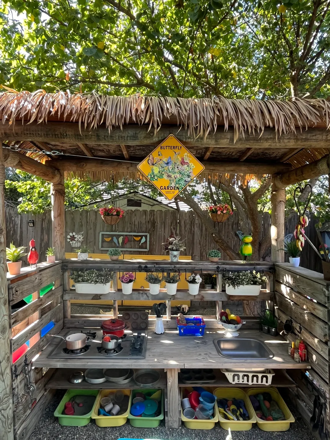 A wooden hut with pots and pans on it.